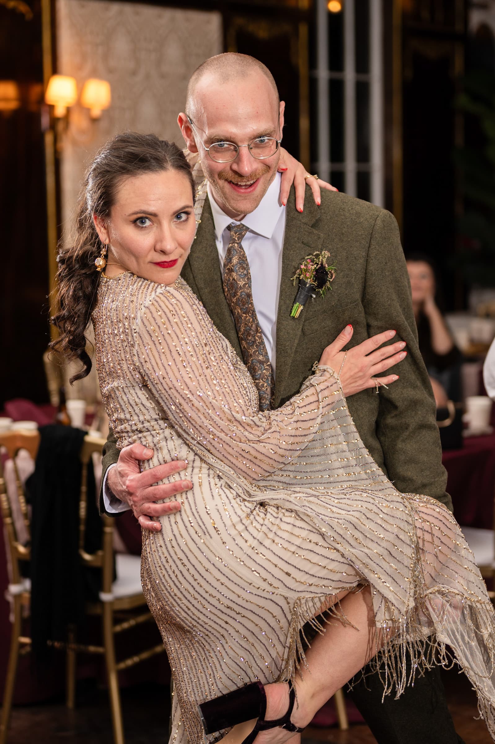 Carly and Conor striking a dramatic pose at their wedding reception