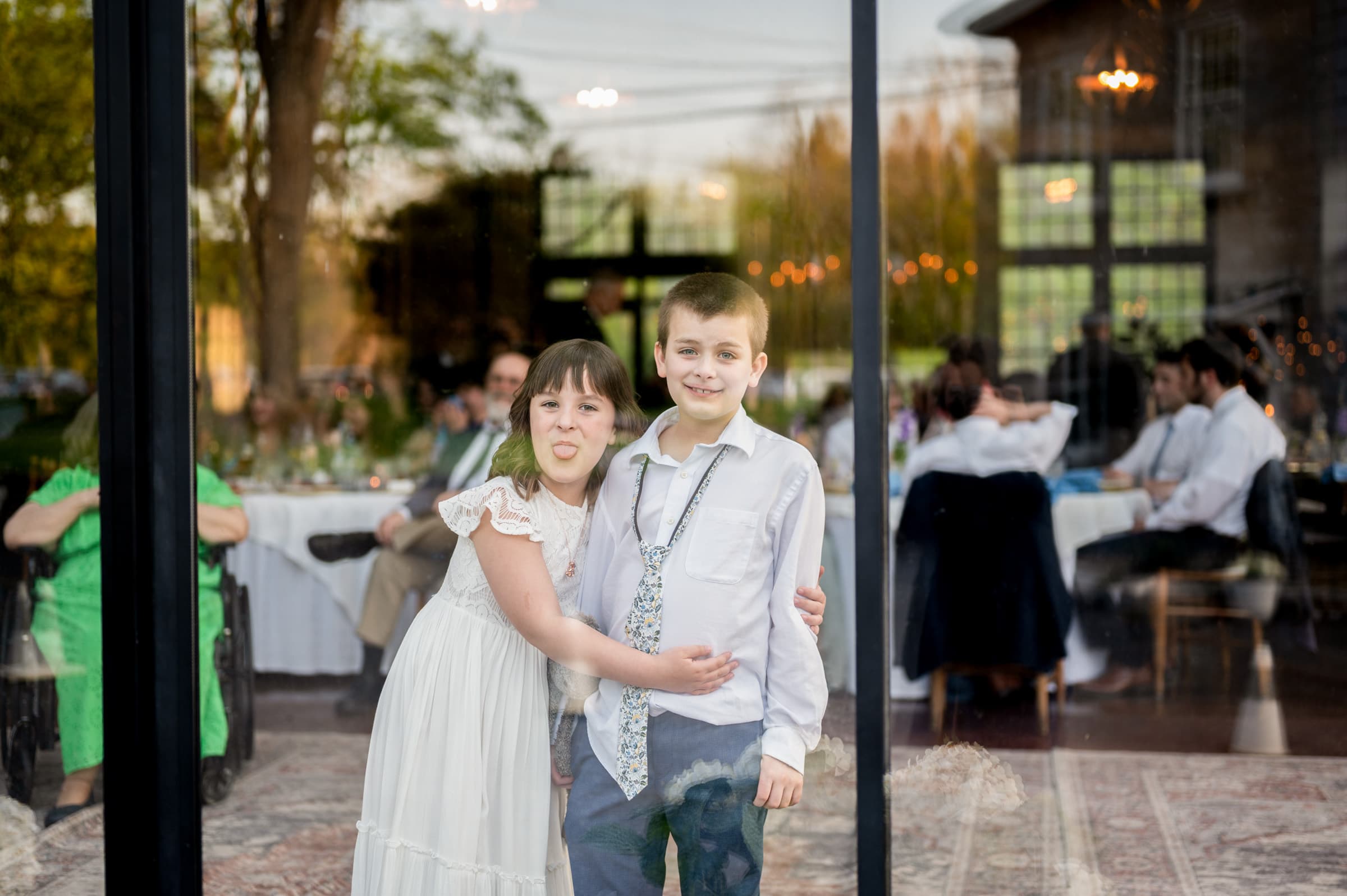 Gray and Holly entertaining themselves at the wedding